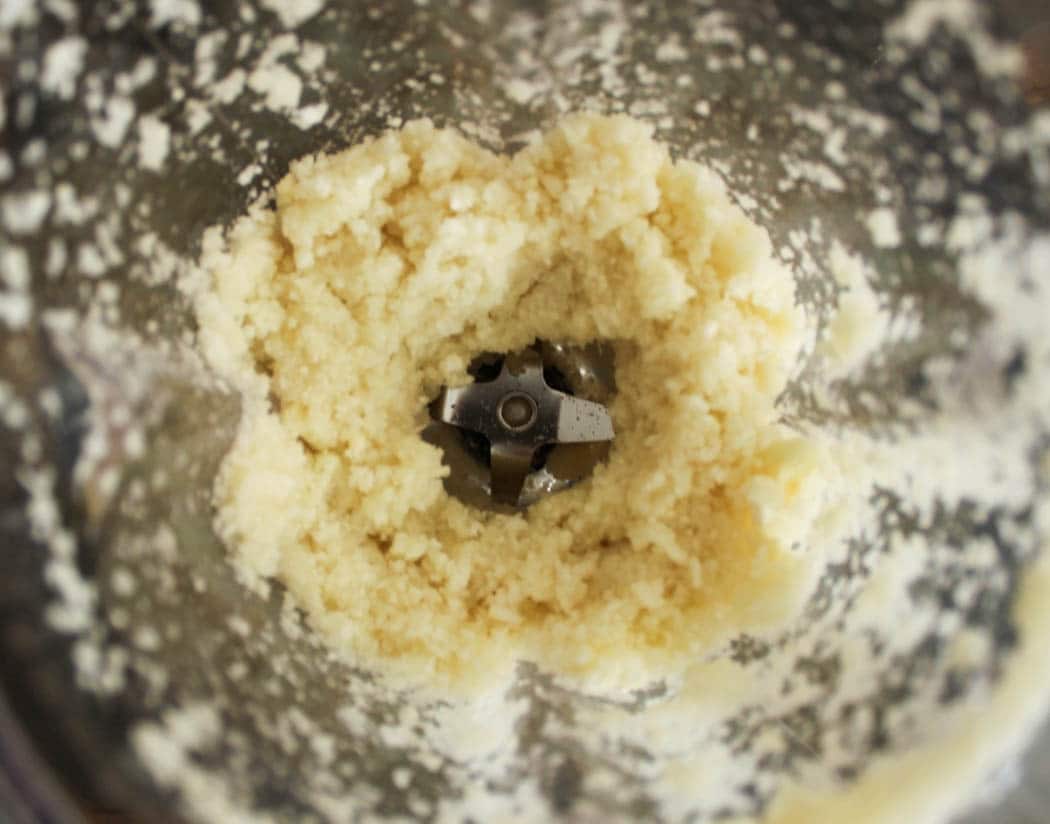 Cauliflower rice in a blender ready for cauliflower pizza crust.