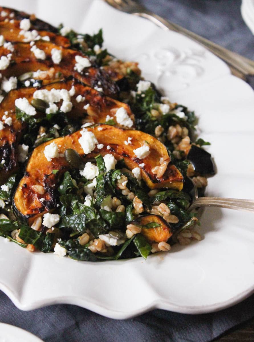 farro-with-chipotle-glazed-acorn-squash-kale-pepitas-feta