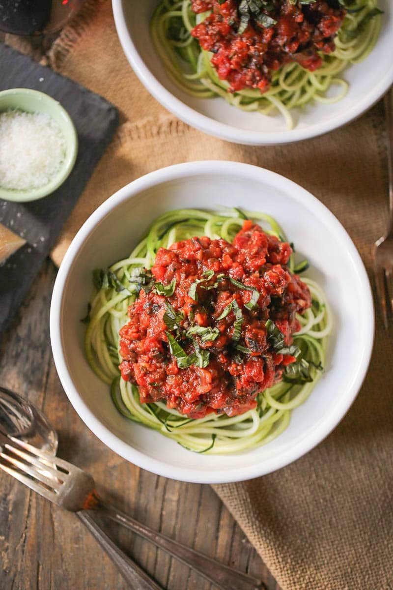 Zucchini Noodles with Portobello Bolognese in bowls.