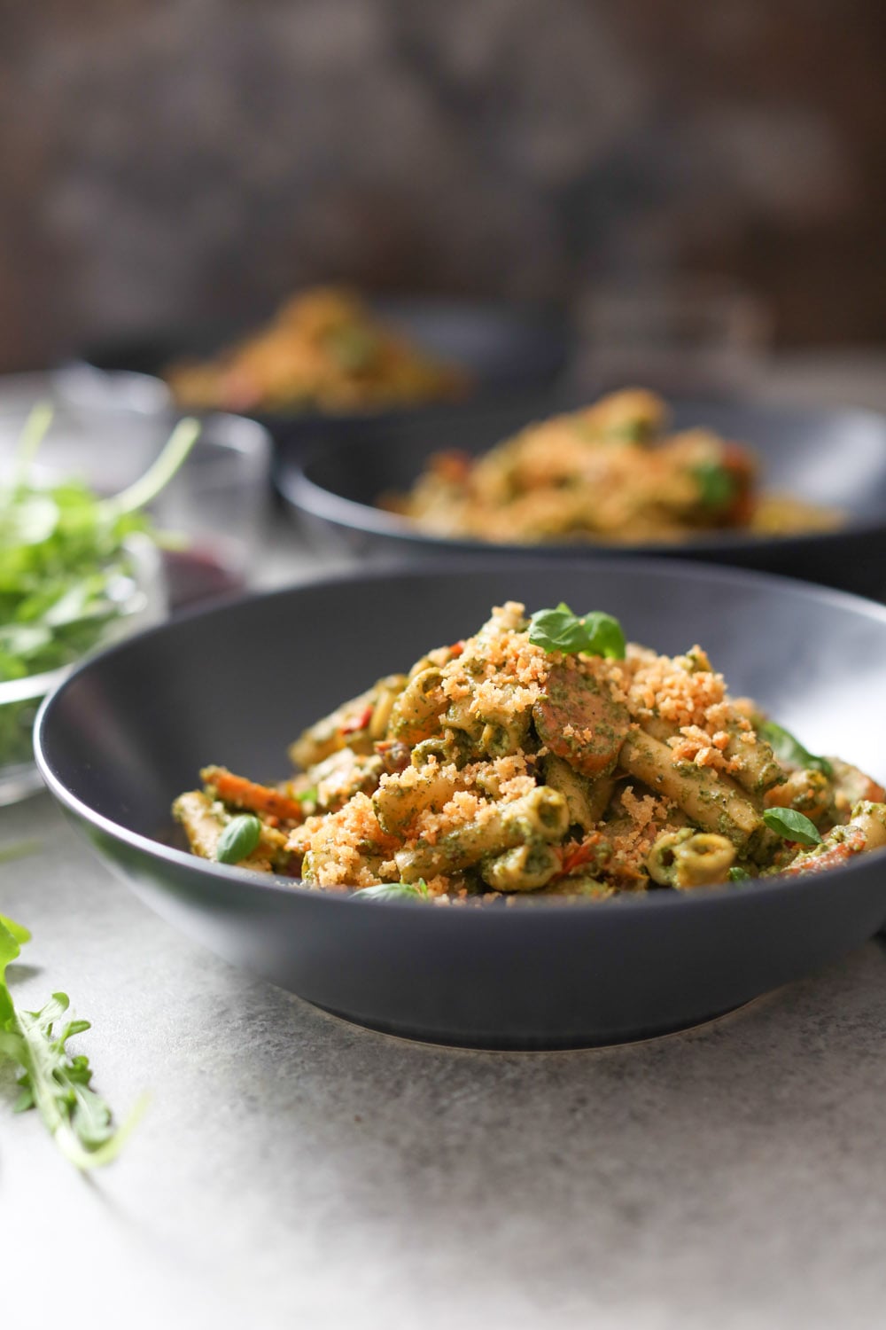 Sausage and Sun-Dried Tomato Pasta with Arugula-Goat Cheese Pesto